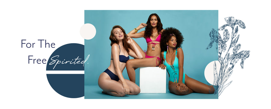 For the free spirited. Woman kneeling wearing a navy blue bikini. Woman sitting on a white cube wearing a hot pink bikini. Woman sitting wearing a turquoise swimsuit