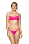 halter swimsuit backless swimwear bikini swim brand travel beachwear resortwear luxury swimwear one piece turquoise blue navy beach travel swimsuit luxury swim brand fashion netaporter selfridges farfetch harrods  africa europe travel blogger London Paris Milan pink  bikini top bikini bottom strapless